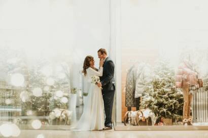 newlywed couple standing face to face
