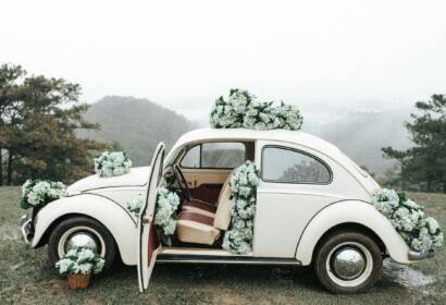 wedding flowers decoration on vintage volkswagen beetle