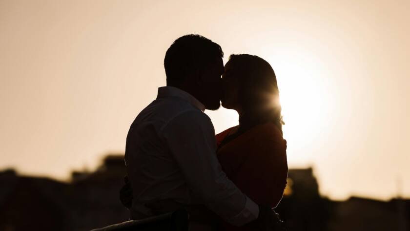 romantic silhouette of a couple at sunset