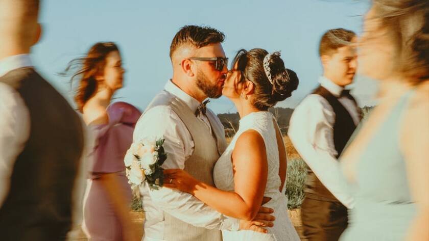 romantic outdoor wedding dance at sunset