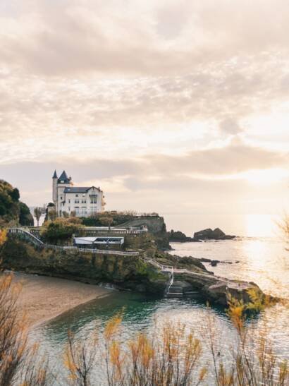 old castle on rocky coast near sea